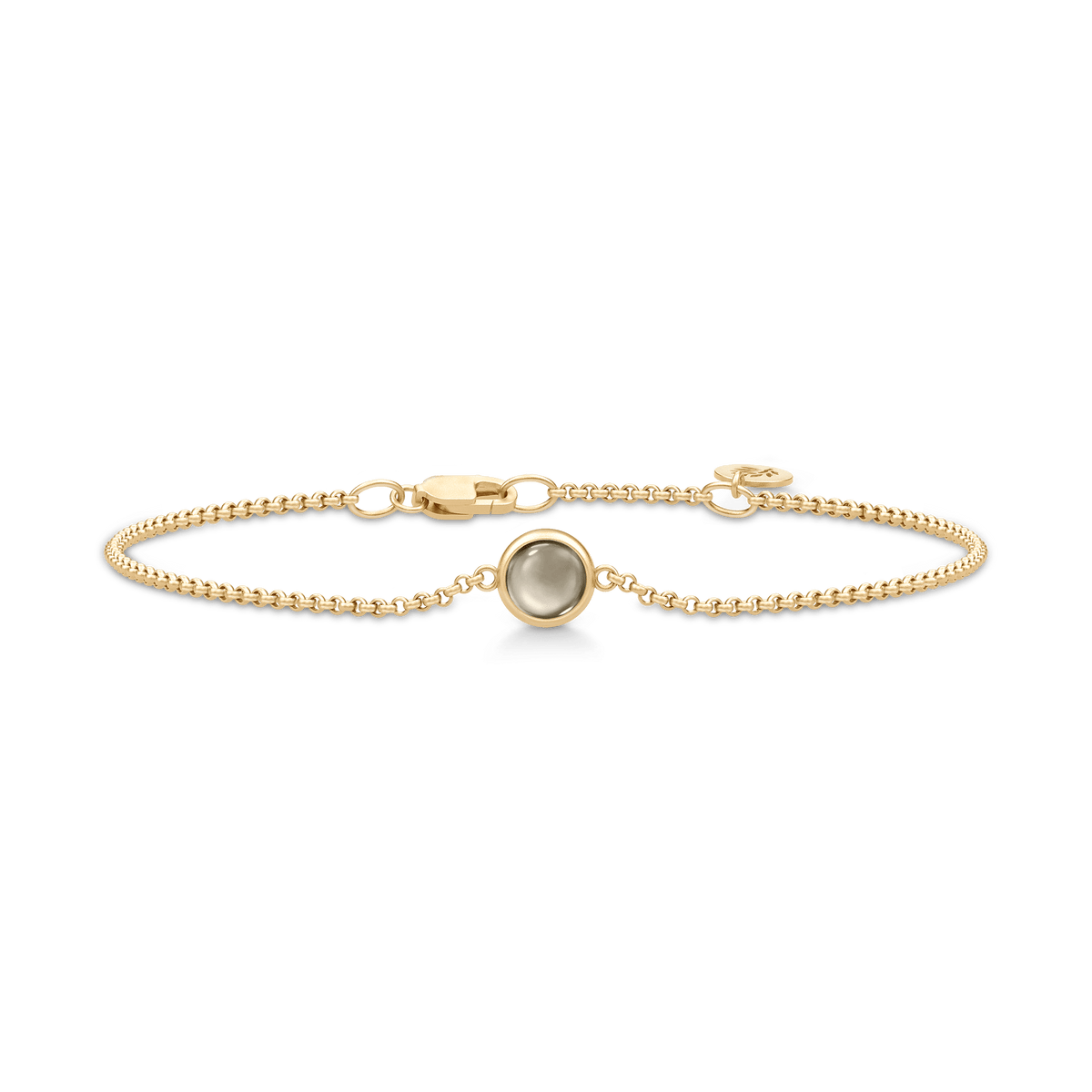 Primini armbånd fra Julie Sandlau i forgylt sølv med gråbrun (røkt) cabochon-krystall
