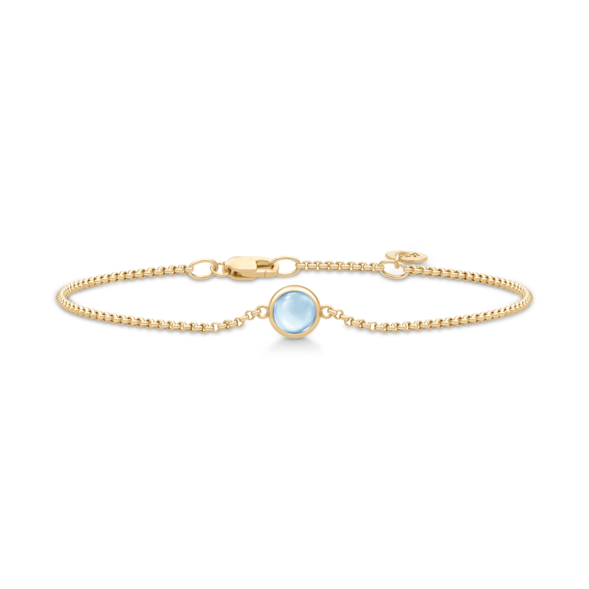Primini armbånd fra Julie Sandlau i forgylt sølv med lyseblå cabochon-krystall